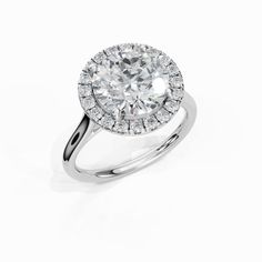 a diamond ring on a white background with the center stone surrounded by small round diamonds