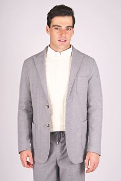 Our unlined, single-breasted blazer in stonewashed jersey cotton offers a sleek, modern silhouette. Perfect for transitioning from the office to all day events Classic Sport Coat With Patch Pockets For Everyday, Spring Unstructured Business Casual Blazer, Unstructured Spring Blazer For Business Casual, Classic Everyday Blazer With Hidden Button Closure, Everyday Unstructured Cotton Blazer, Classic Blazer With Lapel Collar For Everyday, Classic Cotton Sport Coat For Everyday, Classic Everyday Blazer With Lapel Collar, Everyday Blazer With Lapel Collar And Patch Pockets