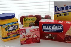 some food is sitting on a table next to other foods and confection items