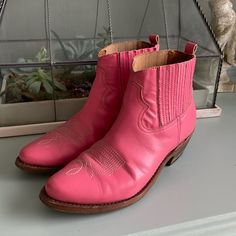 Great Used Condition Pink Low Heel Boots For Spring, Pink Pointed Toe Boots For Fall, Pink Low Heel Boots For Fall, Pink Casual Boots Medium Width, Pink Closed Toe Boots For Fall, Casual Pink Boots Medium Width, Casual Pink Medium Width Boots, Casual Pink Almond Toe Boots, Casual Pink Boots With Reinforced Heel