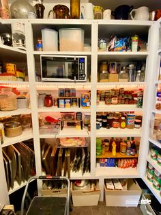 an organized pantry with lots of food and utensils