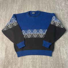 Vintage 90s Turnabout Abstract Design Diamonds Logo 1990s Fashion Basic Essentials Blue Knit Pullover Sweater Medium Mens *W16 Condition:  Excellent Used Condition  = No Flaws Measurements: Please see photos above for all measurements IF YOU BUY TWO OR MORE ITEMS USE THE CODE BUNDLE @ CHECK TO SAVE 20% WE SHIP WITHIN 24 HOURS AFTER PURCHASE! Please be aware that we do not offer free returns!! The Buyer is responsible for the cost of the return label. Follow us on TikTok & Instagram @findsnostalgic and tag us in your finds Retro Blue Crew Neck Sweater, Blue Retro Crew Neck Sweater, 90s Blue Winter Sweater, Retro Blue Knitted Sweater, Retro Blue Long Sleeve Sweater, 90s Style Knitted Winter Sweater, 90s Winter Knitted Sweater, 90s Knitted Winter Sweater, Casual Blue Sweater With Fair Isle Pattern