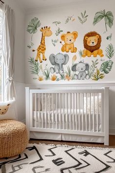 a baby's room decorated with jungle animals and giraffes on the wall