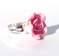 "A pretty pink rose ring Bright cheerful jewellery, a taste of summer all year long.  Each rose is around 1.5cm/3/4 inch in diameter and is on an adjustable silver tone ring  also available as earrings here: https://www.etsy.com/uk/listing/458826102/pink-rose-earrings-rose-dangle-earrings?ref=shop_home_active_1 also available as a necklace here: https://www.etsy.com/uk/listing/398802207/rose-dangle-earrings-necklace-set-flower?ref=shop_home_active_27 More rings here\" https://www.etsy.com/uk/sho Pink Flower Ring For Spring Wedding, Spring Wedding Pink Flower Ring, Spring Pink Flower Ring Gift, Pink Ring For Spring Gift, Pink Ring As Spring Season Gift, Pink Rings Suitable For Spring Gift, Pink Flower Promise Ring, Spring Gift Pink Ring, Spring Gift Pink Rings