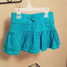 Nwot. Looks Like A Skirt But They Are Shorts. The Picture Color Looks Blue But The Skort Is Actually A Teal. Cute Blue Cotton Skirt, Green Cotton Skort For School, Playful Blue Shorts For School, Blue Cotton Skort For School, Playful Blue Bottoms For School, Cute Cotton Skort For School, Playful Blue Cotton Skirt, Cute Stretch Blue Shorts, Cute Fitted Blue Skort