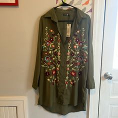 Floral Embroidered Shirt Dress Size Us 8 Army Green Color, Button Down Front And Embroidered Floral Pattern On Front. Can We Worn As A Dress Or An Oversized Button Down! Embroidered Green Blouse For Fall, Long Sleeve Floral Embroidery Shirt Dress For Spring, Long Sleeve Shirt Dress With Floral Embroidery For Spring, Embroidered Long Sleeve Shirt Dress For Spring, Green Tunic Blouse With Floral Embroidery, Embroidered Cotton Shirt Dress For Summer, Spring Long Sleeve Embroidered Shirt Dress, Spring Floral Embroidery Long Sleeve Shirt Dress, Green Cotton Shirt With Floral Embroidery