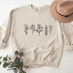 "PLEASE READ ENTIRE DESCRIPTION BEFORE PURCHASING Botanical sweatshirt, Plant lover Shirt, Plant Shirts, Gardening Sweatshirts, Flower Shirt, Gift for her, Floral Sweatshirts Fall in love with this soft and cozy Graphic Tee, Sweatshirt or hoodie  TO MAKE YOUR SHOPPING EXPERIENCE EASIER, YOU CAN \"CHOOSE\" A T SHIRT, SWEATSHIRT OR HOODIE IN THIS LISTING. Available in Shirt, Sweatshirt and Hoodie Tee Shirt Shirt Sleeve Crewneck Unisex 100% Cotton Sweatshirt and Hoodies Long Sleeve Soft 50/50 blend Casual Long Sleeve T-shirt With Plant Print, Casual Long Sleeve Tops With Plant Print, Spring Crew Neck Sweatshirt With Plant Print, Fall Cotton Sweatshirt With Plant Print, Fall Casual Sweatshirt With Plant Print, Spring Cotton Sweatshirt With Plant Print, Casual Plants Print Sweatshirt For Fall, Cotton Sweatshirt With Plants Print For Fall, Spring Plants Print Cotton Sweatshirt