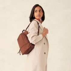 Discover the perfect blend of style and functionality with our Small Chancery Backpack. Designed for the modern woman on the go, this versatile backpack offers the convenience of a backpack with the stylish and sophisticated look of a purse, making it the ideal accessory for work, travel and everyday use. Upgrade your daily carry with our Small Chancery Backpack. Whether you're heading to the office, traveling or running errands, our backpack offers the perfect combination of style, comfort and Chic Travel Backpack With Adjustable Strap, Versatile Backpack With Leather Handles For Daily Use, Modern Travel Backpack With Double Handle, Modern Double Handle Backpack For Travel, Versatile Leather Softback Backpack For On-the-go, Modern Everyday Backpack With Double Handle, Versatile Leather Backpack For On-the-go, Modern Backpack With Double Handle For On-the-go, Versatile Shoulder Bag Backpack For Travel