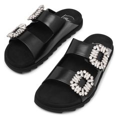 Black leather slides from Roger Vivier. The Slidy Viv slides are made of leather with a rounded toe, featuring two side buckles adorned with crystals, set on a flat rubber outsole. Rubber soleTrue to sizeMade in Italy Black Leather Slides, Black Slides, Roger Vivier, Leather Slides, Slides, Black Leather, In Italy, Italy, Crystals