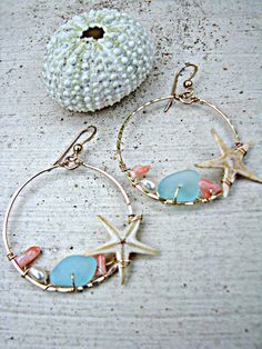 "These hoops are like a walk on the beach! A beachcomber's or treasure hunter's dream! Fit for a mermaid or any girl filled with wanderlust... These 14k Gold-Filled hoops feature REAL starfish, bits of aqua glass and peach coral, and blushy-peach freshwater pearls, that have been woven along the inside edge. The rich colors and beachy-mix add to the allure of these hoops. You will be sure to get a million compliments on your Handmade In Hawaii Hoops... NOTE: Although almost all of my items featu Ocean-inspired Jewelry For Beach Party, Coral Jewelry For Summer Beach Occasions, Bohemian Coral Jewelry For The Beach, Bohemian Coral Jewelry For Beach, Summer Beach Coral Jewelry, Bohemian Pink Jewelry For Beach Party, Coral Bohemian Beach Jewelry, Handmade Pink Jewelry For Beach Party, Pink Beachy Jewelry For Beach Season