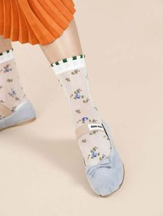 Spring is the thing no matter what time of year it is! channel our favorite season even in fall or winter when you slip on this pair of sheerly delightful floral crew socks.    part of our made in japan series this top-notch pair has a super high needle count for detailing and a hand-closed toe for extra comfort.    nylon  made in japan Name A Better Duo, Delicate Flowers, A Perfect Circle, Favorite Season, Purse Accessories, Designer Style, Basel, Shoes Booties, Leather Gloves