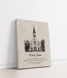 a canvas with an image of a church and the words robert j jordan on it