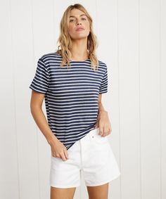 Rue Striped Tee White Stripe Introducing Saint James x Jenni Kayne: elevated basics, from France to LA. Based off of Saint James' iconic striped tees, our exclusive collection fuses French classics with California cool, bringing you a timeless and enduring staple that you'll happily style through every season. 98% linen, 2% elastane. Made in Saint-James, Normandy, France. Linen produced in the Pas-de-Calais region of Northern France in the village of Sailly-les-Lys. Linen softens over time. Wash Jenni Kayne, Elevated Basics, California Cool, Boxy Tee, Saint James, Striped Tee, Exclusive Collection, White Stripe, Relaxed Fit