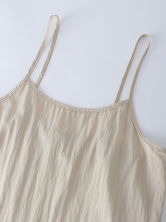 Designed with comfort and style in mind, our Crinkle Cotton Slip Dress-Tan is a must-have. This dress provides a lightweight and breathable option for everyday wear. Casual Solid Wrinkled Dress, Casual Wrinkled Dress, Casual Crinkle Texture Vacation Dress, Casual Sleeveless Dress With Crinkle Texture, Casual Neutral Summer Dress, Neutral Summer Loungewear Dress, Teen Skirts, Crinkle Cotton, Cotton Slip