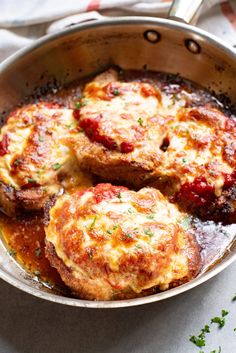 Parmesan Crusted Pork Chops are one of those simple pork chop recipes that will make your mouth water. Parmesan coated pork chops are cooked in a skillet, before being topped with a delicious marinara sauce and mozzarella cheese and baked in the oven. This is great recipe any night of the week and a dish that is sure to be a hit with all your family. // A Cedar Spoon Simple Pork Chop Recipes, Coated Pork Chops, Skillet Pork Chop Recipes, Cheese Pork Chops, Crusted Pork Chops, Parmesan Crusted Pork Chops, Parmesan Pork Chops, Slow Cooker Pork Tenderloin, Pork Chop Recipe