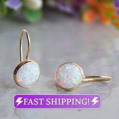 White Opal Earrings Gemstone Earrings 14K Gold Opal | Etsy White Round Fine Jewelry Earrings, Fine Jewelry White Round Earrings, Formal White Earrings With Round Stones, Formal White Round Stone Earrings, Formal White Earrings, Adjustable Round Fine Jewelry Earrings, Fine Jewelry Round Birthstone Earrings, Adjustable Fine Jewelry Earrings For Anniversary, White Oval Hoop Earrings For Gift