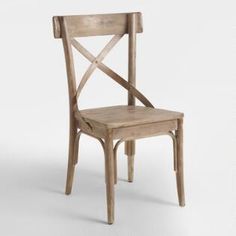 a wooden chair with a cross back design