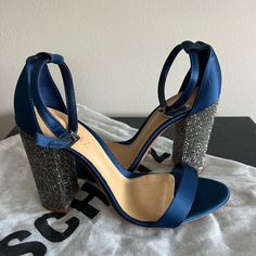 Schutz Hara Blue Satin Dress Heel - Size 9 - Rhinestone Embellishment On The Heel - New With Stickers And Dust Bag - Adjustable Buckle - Heel Height: 4 Inches Formal Blue Synthetic Heels, Blue Embellished Heels For Special Events, Blue 4-inch Heels For Party, Blue Party Heels With Rhinestones, Blue Synthetic Evening Heels, Dark Blue Heels, Glamorous Blue Embellished Heels, Glamorous Embellished Blue Heels, Blue 4-inch Heel Party Heels