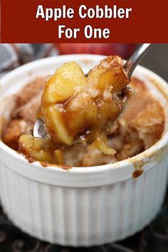 an apple cobbler for one is in a white bowl with the title above it