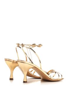 Laminated gold 'Denise' sandal from Ferragamo, with adjustable ankle strap and covered heel. Composition: upper: 100% patent calf lining: 100% goat sole: 100% bos taurus. Luxury Slingback Sandals With Removable Insole And Ankle Strap, Gold Slingback Sandals With Wrapped Heel, Luxury Evening Slingback Sandals With Single Toe Strap, Luxury Formal Slingback Sandals With Single Toe Strap, Gold High Heel Slingback Sandals With Padded Heel, Gold Sandals With Sculpted Heel For Gala, Formal Patent Leather Sandals With Sculpted Heel, Patent Leather Sandals With Sculpted Heel For Formal Occasions, Gold Slingback Sandals With Sculpted Heel