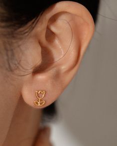 Embrace the elegance of spring with our delicate tulip stud earrings🌷.  These minimalist floral earrings are perfect for everyday wear or special occasions. Tulips symbolize love, rebirth and happiness, making these earrings a thoughtful gift for loved ones on birthdays, anniversaries, or as a token of appreciation. Lightweight and comfortable, they add a touch of sophistication to any outfit. D E T A I L S * Pendant Size: Approximately 6x9 mm * Lightweight: Comfortable to wear all day, subtle Gold Earrings Everyday, Delicate Flower Earrings For Mother's Day Anniversary, Delicate Birth Flower Earrings, Dainty Birth Flower Earrings For Mother's Day, Delicate Rose Gold Birth Flower Earrings, Dainty Flower Earrings For Mother's Day Anniversary, Delicate Flower Earrings For Mother's Day, Dainty Flower Earrings For Anniversary And Mother's Day, Delicate Rose Gold Flower Earrings For Mother's Day