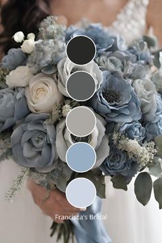 a bridal bouquet with blue flowers and greenery in shades of gray, white and grey