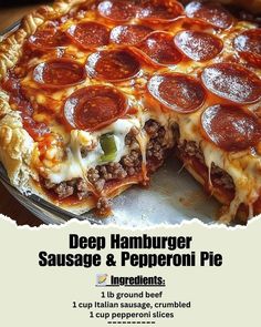 the deep hamburger sausage and pepperoni pie has been cut in half to be eaten