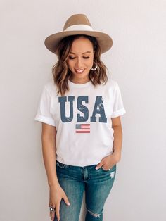 Celebrate your patriotism with our oversized varsity letter USA tee -- our graphic has been distressed to give it a vintage vibe. Perfect for you entire family! Youth sizes here: https://www.etsy.com/listing/1024874437/kids-usa-shirt-retro-usa-t-shirt-youth?ref=shop_home_active_2&pro=1&frs=1 Looking for more 4th of July gear? Check these out: https://www.etsy.com/shop/TheGraphicPeach?ref=seller-platform-mcnav&section_id=33390667 Our shop uses direct-to-garment printing to make our pr July 4th Shirts, 4th Of July Shirts, Fiesta Shirt, Patriotic Tees, Usa Tee, Women Graphic, Fourth Of July Shirts, 4th Of July Shirt, Usa Shirt