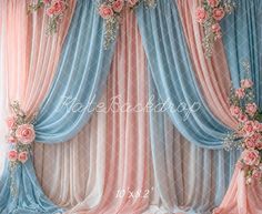 the curtains are decorated with pink and blue flowers