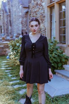 Gothic V-neck Dress For Night Out, Evening A-line Dress With Lace-up Back, Gothic V-neck Dresses For Spring, Fall V-neck Dress With Fitted Bodice, Gothic A-line Mini Dress For Night Out, Fitted Gothic V-neck Dress, Black Long Sleeve Dress With Fitted Bodice, Date Night Corset Dress With Lace Trim, Lace Trim Corset Dress For Date Night