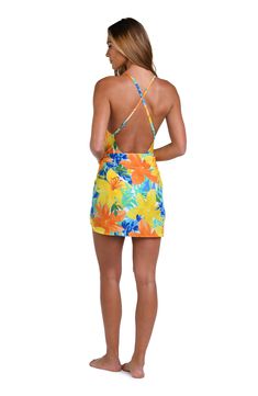 This bright and cheerful floral print has a summery vibe, perfect for a beach day. This short pareo features a one-size-fits-all design which provides a custom fit, and the side tie keeps everything undercover. [split] Details Short pareo cover up Adjustable wrap tie Tassel trim One size fits all Fabric 100% Rayon Crepe Yellow Summer Swimwear With Tie Back, Summer Hibiscus Print Swimwear For Vacation, Vibrant Swimwear For Summer Beach Cover-up, Vibrant Tropical Print Swimwear For The Beach, Vibrant Tropical Print Swimwear For Beach, Hibiscus Print Swimwear For Summer Beach Party, Vibrant Swimwear With Tropical Print For Beach, Vibrant Floral Print Swimwear For Vacation, Tropical Floral Print Beach Dress For Day Out