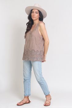 FINAL SALE Brand: Wishlist The Capri Top features an embroidered pattern, with crochet lace detail. ♡ Details Color: Mocha Unlined 100% Cotton Hand wash Sizing Model: Height 5'3"| Bust 32"| Waist 25"| Hips 33" Model is wearing a S/M Loose fit True to size STRETCH AMOUNT: Low MEASUREMENTS: S/M: Bust = 38" | Length = 25" M/L: Bust = 40" | Length = 25" Cotton Tops With Lace Trim Sleeveless Blouse, Spring Casual Camisole With Crochet Trim, Casual Embroidered Top With Lace Trim For Spring, Spring Lace Trim Crochet Camisole Top, Spring Cami Top With Crochet Trim, Spring Camisole Top With Crochet Trim, Cotton Camisole Top With Crochet Trim, Spring Lace Camisole With Crochet Trim, Cotton Camisole With Crochet Trim