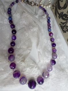 This delicate and pretty necklace sparkles and reflects just the right amount of light. Elegant Purple Agate Beaded Necklaces, Purple Agate Gemstone Beaded Necklace, Elegant Purple Agate Beaded Necklace, Handmade Purple Agate Beaded Necklaces, Spiritual Purple Agate Beaded Necklaces, Purple Agate Spiritual Beaded Necklace, Spiritual Purple Agate Necklaces, Pretty Necklace, Pretty Necklaces