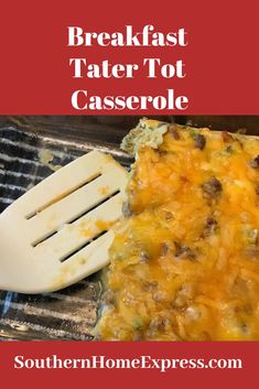 a casserole on a grill with a spatula next to it and the words, breakfast tater tot casserole