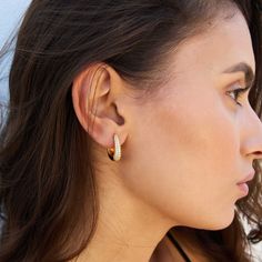 Tapered pavé dôme hoop earrings in 18k gold vermeil with cz stones. 18k gold vermeil (.925 sterling silver) 15mm diameter 4mm width 18mm length Tarnish Resistant Gold-plated Hoop Ear Cuff, Modern 14k Gold-filled Pierced Hoop Earrings, 14k Gold-filled Gold-tone Hoop Earrings, 14k Gold-filled Tarnish-resistant Hoop Earrings, Luxury Tarnish Resistant Gold-tone Hoop Earrings, Jewelry Online Shopping, Cz Stone, Gold Vermeil, Jewelry Shop