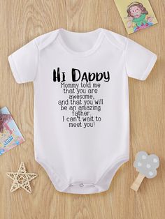 a white baby bodysuit with the words'h daddy'written in black on it