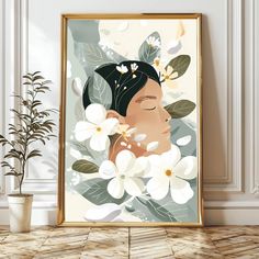 an art print featuring a woman's face surrounded by white flowers