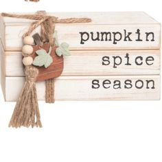 a wooden box with pumpkins and spices hanging from it's side, which says pumpkin in spice season