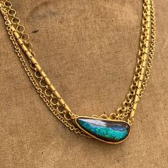 BLACK OPAL SET IN 22K GOLD ON CARTOUCHE LINK CHAIN, 25.18 CARAT • DESIGNED AND HAND FORGED IN NEW YORK • LENGTH: 19 INCHES Please email info@elihalili.com or call the studio at 212-941-7979 for any inquiries. 22k Gold Necklace Chains, Ruby Sapphire, Ancient Coins, Gold Brass, Brass Jewelry, Opal Necklace, Black Opal, 22k Gold, Hand Forged