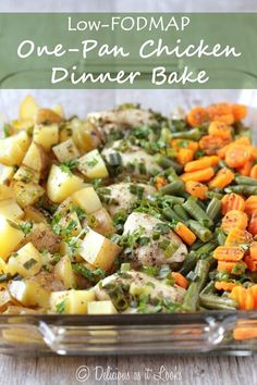 a glass casserole dish filled with potatoes, green beans and other veggies