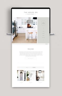 the home on website is displayed on a tabletop with an image of a kitchen in the background