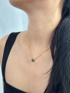 Vibrant and elegant – just like her namesake. Gaia represents a gentle, nurturing hug from us to you, and a steadfast companion through the highs and lows of everyday life. Green Round Necklace Gift For Her, Green Round Pendant Necklace For Her, Round Emerald Necklace As Gift, Green Round Pendant Jewelry For Everyday, Everyday Green Round Pendant Jewelry, Elegant Adjustable Emerald Gemstone Necklace, Everyday Gemstone Necklace With Round Pendant, Everyday Gemstone Round Pendant Necklace, Delicate May Birthstone Necklaces For Her