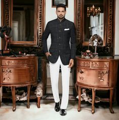 Elevate your style quotient with our exquisite Tweed Check Jodhpuri Suit, a perfect blend of timeless elegance and contemporary fashion. This meticulously crafted ensemble brings together the sophistication of traditional Jodhpuri attire and the rugged charm of tweed fabric. 🔹 Premium Tweed Fabric: Handpicked tweed fabric adds a distinctive texture and warmth to this suit. Its luxurious feel ensures comfort without compromising on style. 🔹 Impeccable Check Pattern: The subtle yet striking chec Classic Bandhgala For Workwear And Festive Occasions, Classic Bandhgala For Festive Workwear, Classic Festive Bandhgala For Workwear, Designer Nehru Jacket For Festive Workwear, Tailored Nehru Jacket For Festive Designer Wear, Designer Tailored Nehru Jacket For Festive Occasions, Designer Tailored Long Sleeve Kurta, Tailored Long Sleeve Bandhgala For Designer Wear, Designer Long Sleeve Tailored Kurta