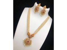 *DESCRIPTION* *NECKLACE WITH EARRINGS* *NECKLACE CLOSURE IS HOOK* *PUSH BACK EARRINGS* *LENGTH OF EARRINGS - 2.1 INCHES (APPROX)* *GOLD PLATED , PEARLS , KEMP STONE , CZ BEADS* *LIGHTWEIGHT* *PERFECT GIFT FOR YOUR LOVED ONES* *FOR ANY QUERIES AND INFORMATION PLEASE MESSAGE US*  *SHOP LINK - https://www.etsy.com/shop/JAYASJEWELRSART?ref=profile_header * Occasion : Birthday Events, Lovely Valentine's Day Gift, Anniversary Gift, Weeding Gift, Engagement Ring, Lover Gift Ring, Hen Party And Other Occasion.... Your order will be handmade and ready for shipment in 1 to 3 business days Normally we ship via USPS it takes 15 - 20 days if you need faster delivery You can select Shipping in your cart. Wedding Pearl Chain Necklace, White Chain Necklace For Wedding, Gold Long Bridal Necklace For Wedding, Costume Jewelry Pendant Necklace For Wedding, Costume Jewelry Long Necklace For Wedding, Wedding Costume Jewelry Long Necklace, Gold Costume Jewelry Pearl Necklace For Wedding, Punjabi Jewelry, Diamond Necklace Indian