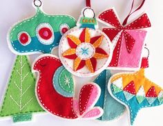 an ornament made out of felt hanging on a wall