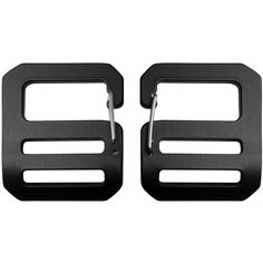 pair of black metal buckles on white background