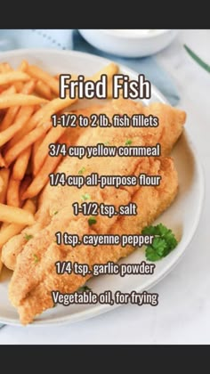 fried fish and french fries on a white plate