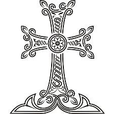 an ornate cross is shown in black and white