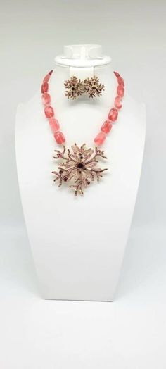 "Coral Branch Necklace, Coral Branch Earrings, Heidi Daus Set, Coral Reef Necklace, Coral Reef Earrings, Ocean Necklace, Ocean Earrings Measurements:  Necklace- 18\" L x 5/8\" W x 3/8\" H with a 4\" extender chain. Pendant is 3-1/2\" L x 3-1/2\" W x 3/4\" H. Earrings- 1 1/4\"L by 1 1/2\"W. Metal: Bronze Tone Findings:  Necklace- Hook Closure, easy on and off! Earrings- Omega back for pierced ears Finish: Polished, Oxidized If I could choose to be any mythical creature in the world it would absolutely have to be a mermaid. The ability to swim with all of the amazing animals, and to see the beauty of a completely underwater world would be AMAZING. Ariel wouldn't agree, but I think coral reefs are so fascinating, and that is why I love this set from Heidi Daus so very much. Rosy colored glass Costume Jewelry Brooch For Gift, Elegant Christmas Jewelry With Brooch, Elegant Christmas Brooch Jewelry, Faceted Costume Jewelry As Gift, Faceted Costume Jewelry As A Gift, Elegant Pink Christmas Jewelry, Handmade Pink Jewelry For Christmas, Coral Jewelry Set, Ocean Earrings