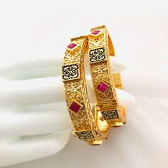 2.6 Golden Kundan bangles/Pair of 2/Ruby CZ Kundan Bangles/Cubic Zirconia/semi-precious/Indian/Pakistani/Bollywood/Ethnic Bangles Features Traditional American diamond bracelet Handcrafted To Perfection Light Weight Perfect For Indian Weddings And Celebrations A Beautiful & Memorable Gift for Weddings and Special Occasions Pair of two Bangles. Ruby Bangles, Kundan Bangles, Cz Bracelet, The Bangles, Bangles Indian, Pakistani Jewelry, Kundan Necklaces, Emerald Necklace, Diamond Bangle